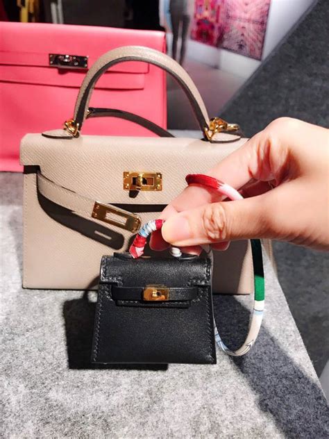 hermes mini shopping bag charm|hermes straps for handbags.